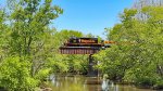 WE 7024 crosses the Tuscarawas River.